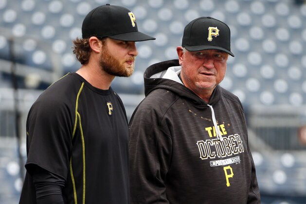 Pittsburgh Pirates Wild Card game starting pitcher Gerrit Cole, left, stands with manager Clint Hurdle during a workout day, Tuesday, Oct. 6, 2015, for Wednesday's National League Wild Card game against the Chicago Cubs at PNC Park in Pittsburgh. (AP Photo/Gene J. Puskar)