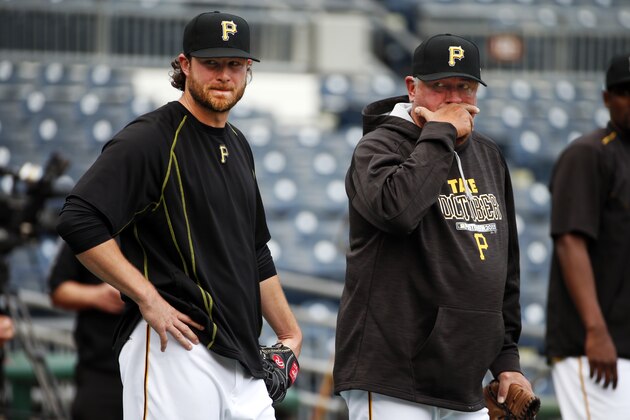 Pittsburgh Pirates Wild Card game starting pitcher Gerrit Cole, left, stands with manager Clint Hurdle during a workout, Tuesday, Oct. 6, 2015, for Wednesday's National League Wild Card game against the Chicago Cubs at PNC Park in Pittsburgh. (AP Photo/Gene J. Puskar)