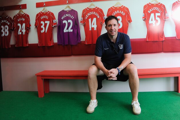 MUMBAI, INDIA - DECEMBER 12: Robbie Fowler poses for a photograph inside the Liverpool FC tent during the Barclays Premier League 'Live' event  on December 12, 2014 in Mumbai, India. (Photo by Pal Pillai/Getty Images for Premier League)