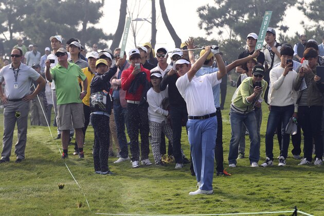 International team player Louis Oosthuizen watches his shot on the 12th hole during a practice round ahead of the Presidents Cup golf tournament at Jack Nicklaus Golf Club Korea in Incheon, South Korea, Wednesday, Oct. 7, 2015. (AP Photo/Ahn Young-joon)