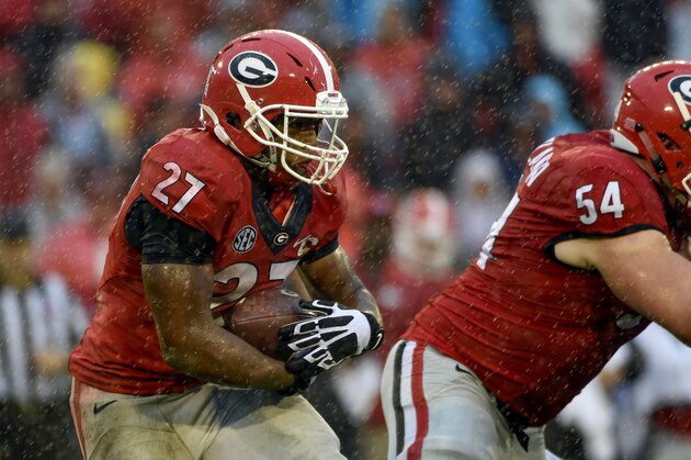 Oct 3, 2015; Athens, GA, USA; Georgia Bulldogs running back Nick Chubb (27) runs the ball during the third quarter against the Alabama Crimson Tide at Sanford Stadium. Alabama defeated Georgia 38-10. Mandatory Credit: John David Mercer-USA TODAY Sports