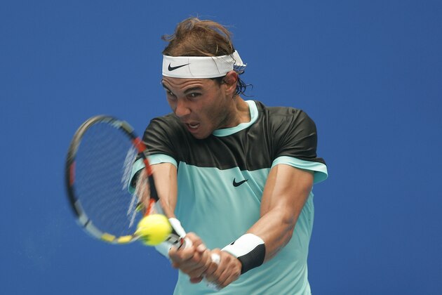 BEIJING, CHINA - OCTOBER 06:  Rafael Nadal of Spain returns a shot against Wu Di of China during the Men's singles first round match on day four of the 2015 China Open at the China National Tennis Centre on October 6, 2015 in Beijing, China.  (Photo by Lintao Zhang/Getty Images)