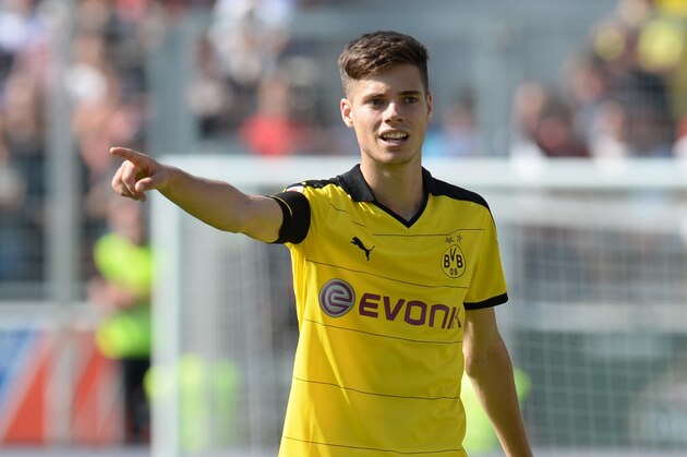 Dortmund's midfielder Julian Weigl gestures during the German first division Bundesliga football match FC Ingolstadt 04 vs Borussia Dortmund, on August 23, 2015 in Ingolstadt, southern Germany.   AFP PHOTO / CHRISTOF STACHE

RESTRICTIONS: DURING MATCH TIME: DFL RULES TO LIMIT THE ONLINE USAGE TO 15 PICTURES PER MATCH AND FORBID IMAGE SEQUENCES TO SIMULATE VIDEO. 
== RESTRICTED TO EDITORIAL USE == FOR FURTHER QUERIES PLEASE CONTACT DFL DIRECTLY AT + 49 69 650050.        (Photo credit should read CHRISTOF STACHE/AFP/Getty Images)