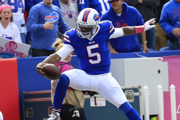Buffalo Bills quarterback Tyrod Taylor jumps into the end zone for a touchdown against the New York Giants that was later nullified by a penalty during the second half of an NFL football game, Sunday, Oct. 4, 2015, in Orchard Park, N.Y. (AP Photo/Bill Wippert)