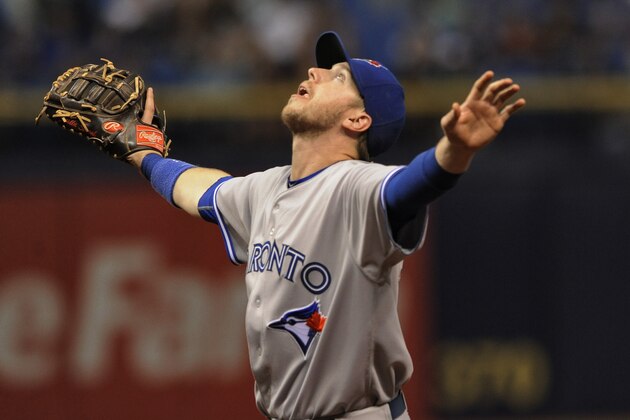 Toronto Blue Jays first baseman Justin Smoak calls for a pop fly during a baseball game against the Tampa Bay Rays Saturday, Oct. 3, 2015, in St. Petersburg, Fla. (AP Photo/Steve Nesius)