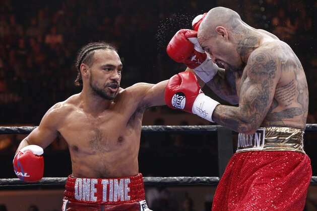 TAMPA, FL - JULY 11:  Keith Thurman (L) exchanges blows with Luis Collazo during their WBA Welterweight fight on July 11, 2015 at the USF Sun Dome in Tampa, Florida.  (Photo by Brian Blanco/Getty Images)