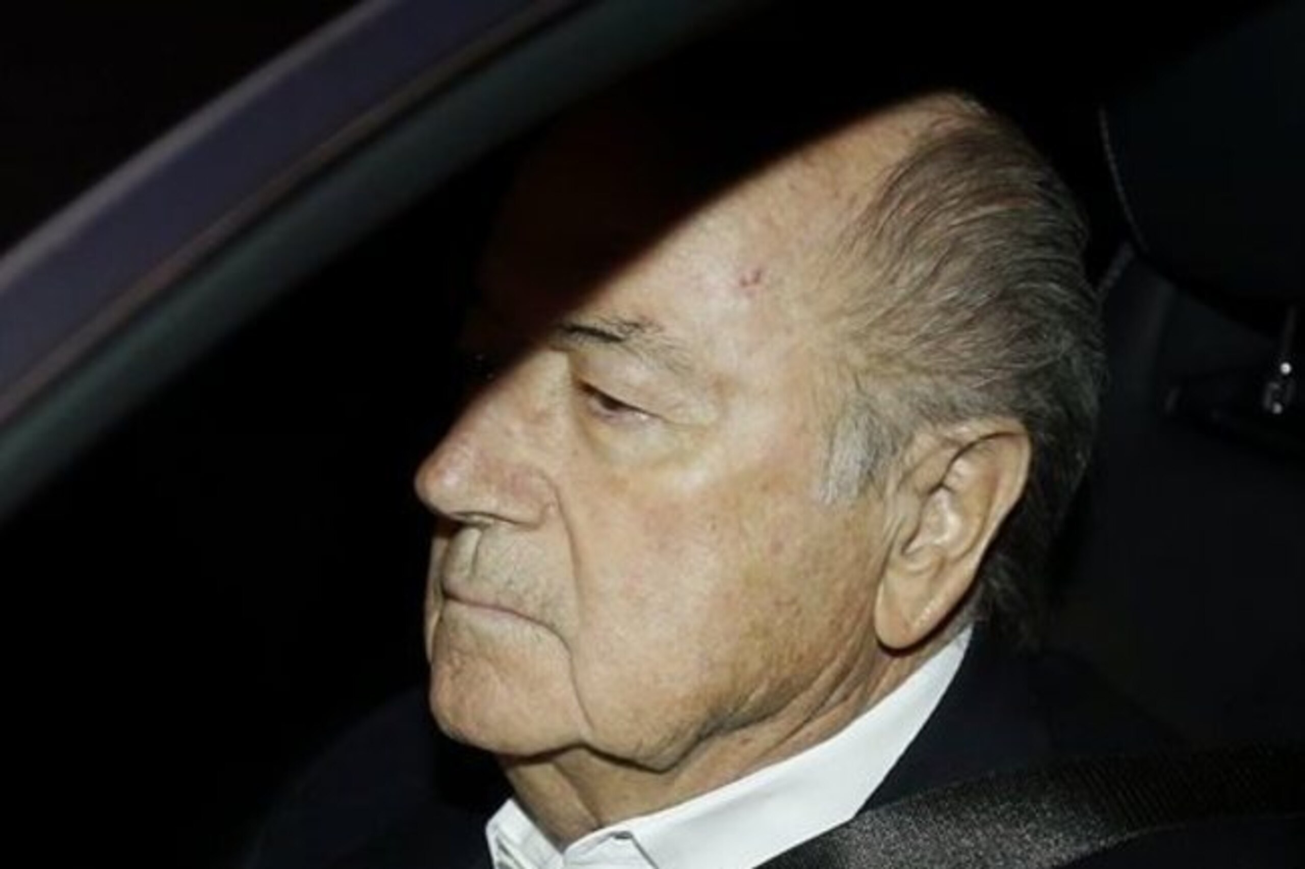 FIFA President Sepp Blatter drives his car into the garage of the FIFA headquarters on his way to work in Zurich, Switzerland, Tuesday, Sept. 29, 2015. Blatter was questioned by Swiss investigators on Friday about why FIFA paid 2 million Swiss francs (about $2 million) to UEFA President Michel Platini in 2011 for work supposedly carried out at least nine years earlier. (AP Photo/Michael Probst)
