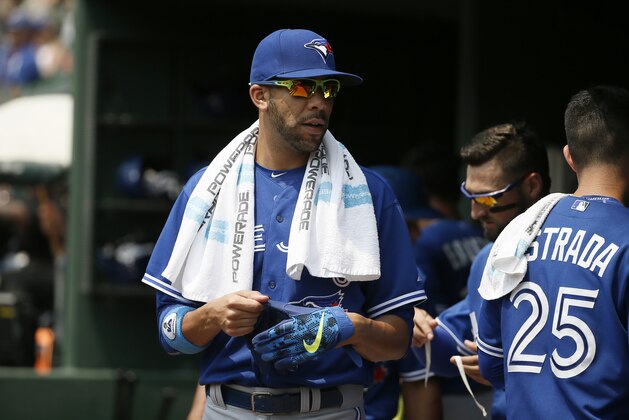 Toronto Blue Jays' David Price walks through the dugout in the first inning of a baseball game against the Texas Rangers Thursday, Aug. 27, 2015, in Arlington, Texas. (AP Photo/Tony Gutierrez)