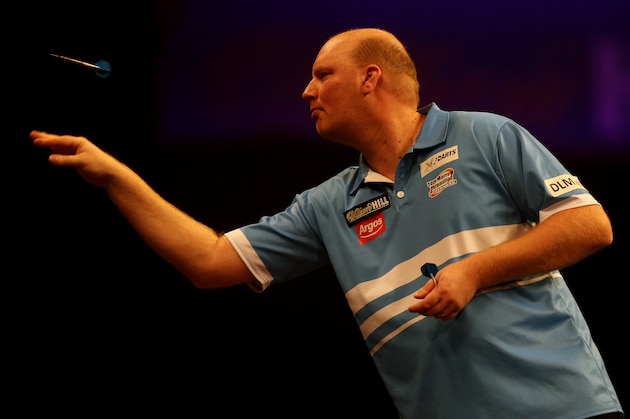 LONDON, ENGLAND - JANUARY 02:   Vincent van der Voort of the Netherlands in atcion  during his quarter final match against  Phil Taylor of Englan during his quarter final match against on day twelve of the 2015 William Hill PDC World Darts Championships at Alexandra Palace on January 2, 2015 in London, England.  (Photo by Ben Hoskins/Getty Images)