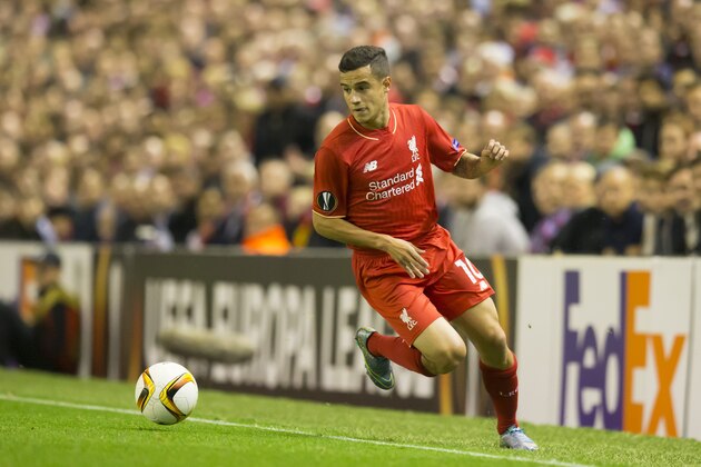 Liverpool's Philippe Coutinho takes the ball downfield during the Europa League Group B soccer match between Liverpool and FC Sion at Anfield Stadium, Liverpool, England, Thursday Oct. 1, 2015. (AP Photo/Jon Super)