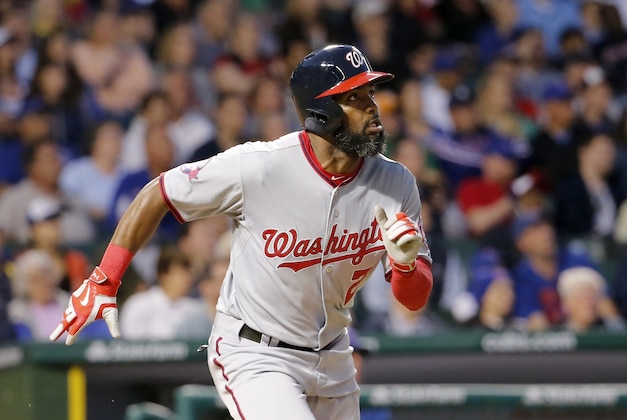 Washington Nationals' Denard Span (2) watches his home run off Chicago Cubs relief pitcher Pedro Strop during the eighth inning of a baseball game Tuesday, May 26, 2015, in Chicago. (AP Photo/Charles Rex Arbogast)