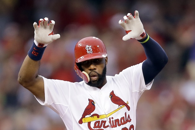 St. Louis Cardinals' Jason Heyward gestures toward the dugout after hitting an RBI double during the fifth inning of a baseball game against the San Diego Padres Thursday, July 2, 2015, in St. Louis. (AP Photo/Jeff Roberson)