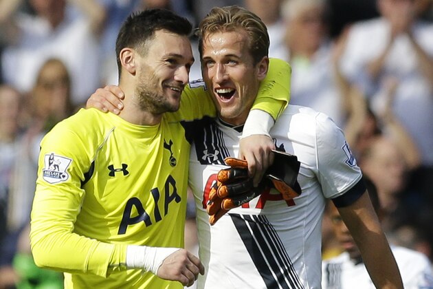 Tottenham Hotspur's goalkeeper captain Hugo Lloris, left, and Harry Kane celebrate together after the final whistle in their 4-1 win over Manchester City in the English Premier League soccer match between Tottenham Hotspur and Manchester City at White Hart Lane stadium in London, Saturday, Sept. 26, 2015.  (AP Photo/Matt Dunham)