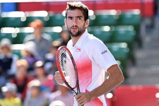 Marin Cilic of Croatia reacts after winning the first set against Steve Johnson of the US during their second round match at the Japan Open tennis tournament in Tokyo on October 8, 2015.      AFP PHOTO / Toru YAMANAKA        (Photo credit should read TORU YAMANAKA/AFP/Getty Images)