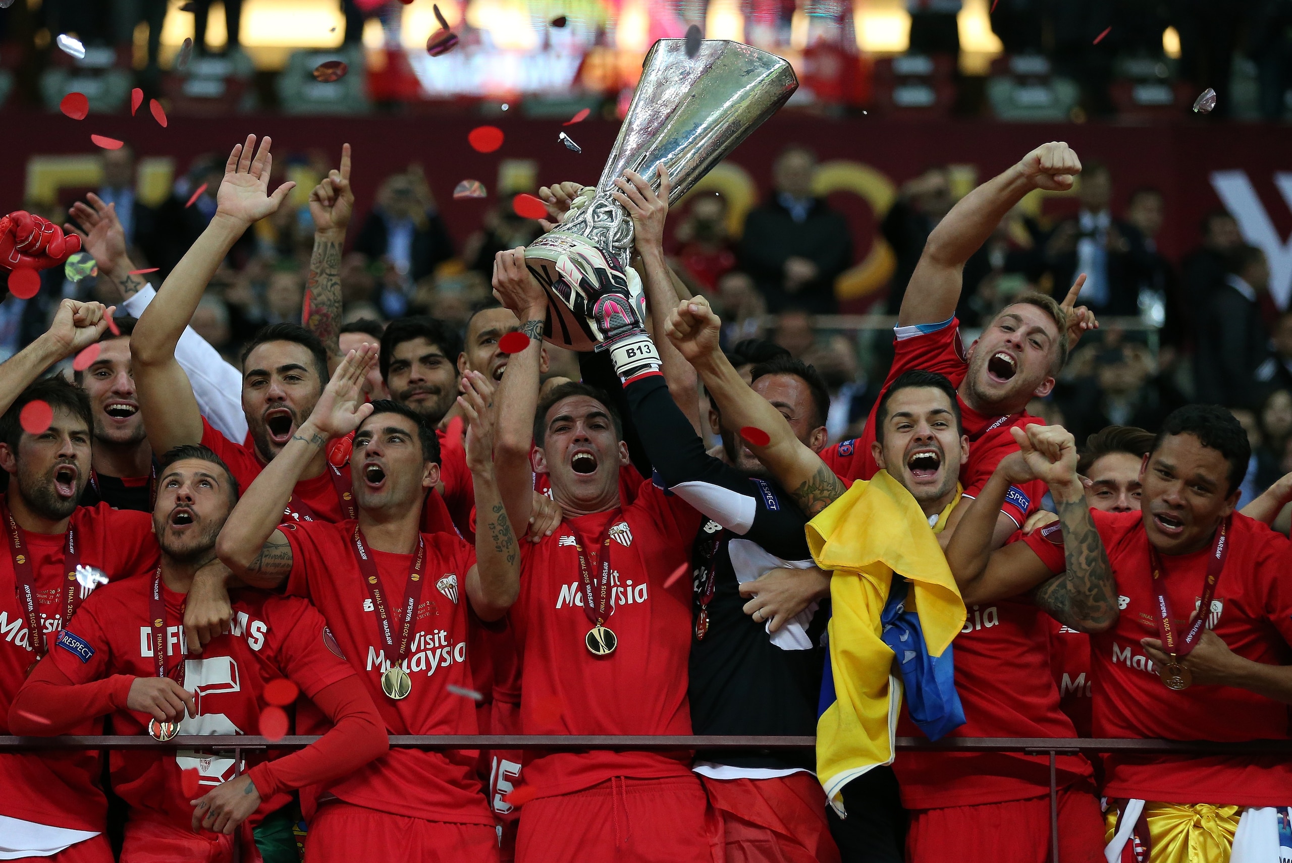 WARSAW, POLAND - MAY 27: Fernando Navarro of FC Sevilla lifts the trophy following the UEFA Europa League Final match between FC Dnipro Dnipropetrovsk and FC Sevilla at the National Stadium on May 27, 2015 in Warsaw, Poland. (Photo by Chris Brunskill Ltd/Getty Images)