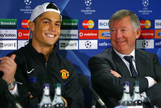 MANCHESTER, ENGLAND - APRIL 06:  Cristiano Ronaldo of Manchester United and Sir Alex Ferguson the manager of Manchester United face the media during a press conference held at Old Trafford on April 6, 2009 in Manchester, England.  (Photo by Alex Livesey/Getty Images)