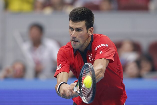 BEIJING, CHINA - OCTOBER 06:  Novak Djokovic of Serbia returns a shot against SimoneBolelli of Italy during the Men's singles first round match on day four of the 2015 China Open at the China National Tennis Centre on October 6, 2015 in Beijing, China.  (Photo by Lintao Zhang/Getty Images)