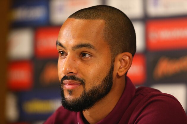 BURTON-UPON-TRENT, ENGLAND - OCTOBER 07:  Theo Walcott of England faces the media during a press conference at St Georges Park on October 7, 2015 in Burton-upon-Trent, England.  (Photo by Alex Livesey/Getty Images)
