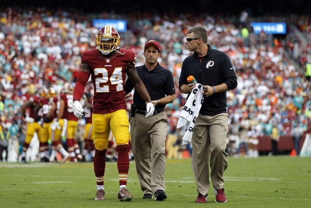 Washington Redskins strong safety Duke Ihenacho (24) walks off the field after injuring himself during the first half of an NFL football game against the Miami Dolphins, Sunday, Sept. 13, 2015, in Landover, Md. (AP Photo/Patrick Semansky)