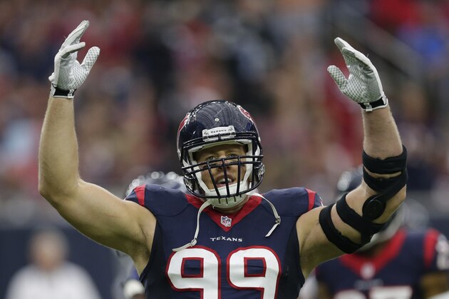 Houston Texans defensive end J.J. Watt (99) tries to fire up the crowd during the first half of an NFL football game Sunday, Sept. 27, 2015, in Houston. (AP Photo/David J. Phillip)