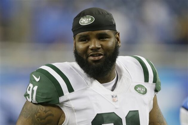 FILE - In this Aug. 13, 2015, file photo, New York Jets defensive end Sheldon Richardson (91) walks off the field following an NFL preseason football game against the Detroit Lions in Detroit. A Missouri judge has continued until next month the criminal case against Jets defensive lineman Sheldon Richardson, accused of resisting arrest and traffic counts for a summer police chase in suburban St. Louis. A court hearing was canceled Monday, Oct. 5, 2015.  (AP Photo/Duane Burleson, File)