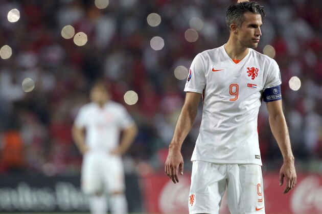 Robin Van Persie of the Netherlands reacts after they lost 3-0 to Turkey during their Euro 2016 Group A qualifying soccer match at the Buyuksehir Torku Arena Stadium in Konya, Turkey, Sunday, Sept. 6, 2015. (AP Photo)