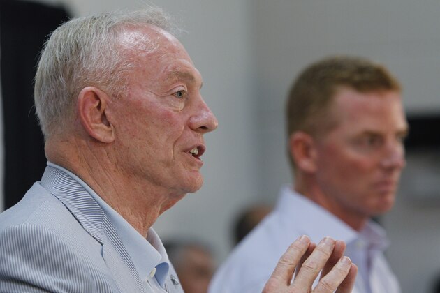Dallas Cowboys owner Jerry Jones, left, and head coach Jason Garrett, right, take part in a news conference, Wednesday, July 28, 2011, in San Antonio. (AP Photo/Eric Gay)