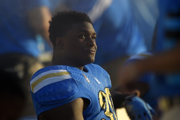 UCLA linebacker Myles Jack looks on from the bench during the second half of an NCAA college football game against Stanford, Friday, Nov. 28, 2014, in Pasadena, Calif. Stanford won 31-10. (AP Photo/Mark J. Terrill)
