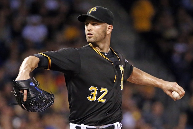 Pittsburgh Pirates starting pitcher J.A. Happ (32) delivers in the first inning of a baseball game against the St. Louis Cardinals in Pittsburgh, Monday, Sept. 28, 2015. (AP Photo/Gene J. Puskar)