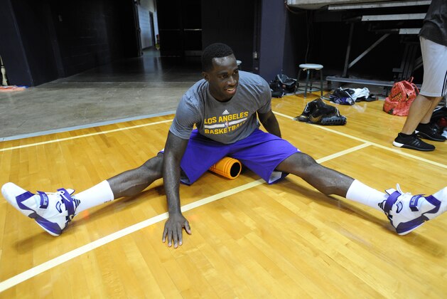 HONOLULU, HI - SEPTEMBER 29: Brandon Bass of the Los Angeles Lakers stretches during training camp on September 29, 2015 at the University of Hawaii, in Honolulu, Hawaii.  NOTE TO USER: User expressly acknowledges and agrees that, by downloading and/or using this Photograph, user is consenting to the terms and conditions of the Getty Images License Agreement. Mandatory Copyright Notice: Copyright 2015 NBAE (Photo by Andrew D. Bernstein/NBAE via Getty Images)