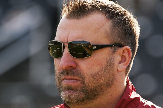 Arkansas head coach Bret Bielema watches his team warm up before the start of an NCAA college football game against Missouri Friday, Nov. 28, 2014, in Columbia, Mo. (AP Photo/L.G. Patterson)