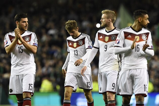 (L-R) Germany's forward Kevin Volland, Germany's midfielder Thomas Mueller, Germany's midfielder Andre Schuerrle and Germany's midfielder Karim Bellerabi react after losing a UEFA Euro 2016 Group D qualifying football match between Germany and Ireland at the Aviva stadium in Dublin on October 8, 2015. AFP PHOTO / TOBIAS SCHWARZ        (Photo credit should read TOBIAS SCHWARZ/AFP/Getty Images)