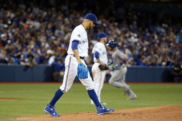 TORONTO, ON - OCTOBER 08:  David Price #14 of the Toronto Blue Jays walks back to the mound against the Texas Rangers during game one of the American League Division Series at Rogers Centre on October 8, 2015 in Toronto, Ontario, Canada.  (Photo by Tom Szczerbowski/Getty Images)