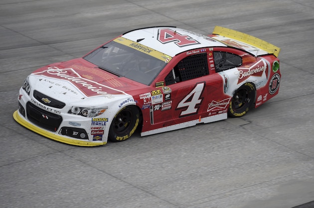 Kevin Harvick drives his car during the NASCAR Sprint Cup series auto race, Sunday, Oct. 4, 2015, at Dover International Speedway in Dover, Del. (AP Photo/Nick Wass)
