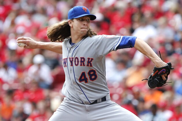 New York Mets starting pitcher Jacob deGrom throws in the second inning of a baseball game against the Cincinnati Reds, Sunday, Sept. 27, 2015, in Cincinnati. (AP Photo/Aaron Doster) New York Mets starting pitcher Jacob deGrom throws in the second inning of a baseball game against the Cincinnati Reds, Sunday, Sept. 27, 2015, in Cincinnati. (AP Photo/Aaron Doster)