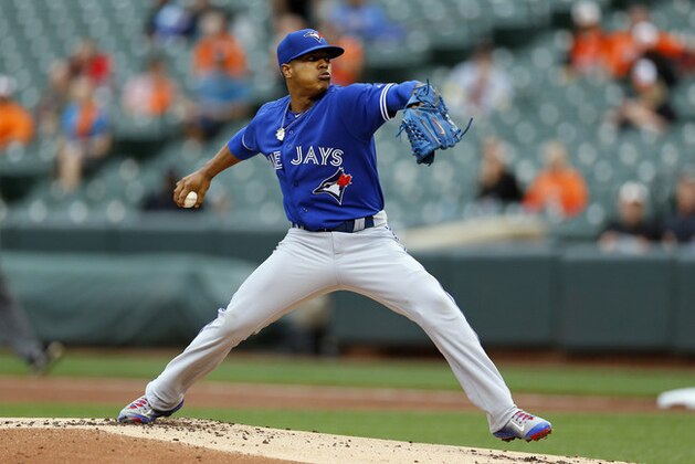 Toronto Blue Jays starting pitcher Marcus Stroman throws to the Baltimore Orioles in the first inning in the first baseball game of a doubleheader, Wednesday, Sept. 30, 2015, in Baltimore. (AP Photo/Patrick Semansky)