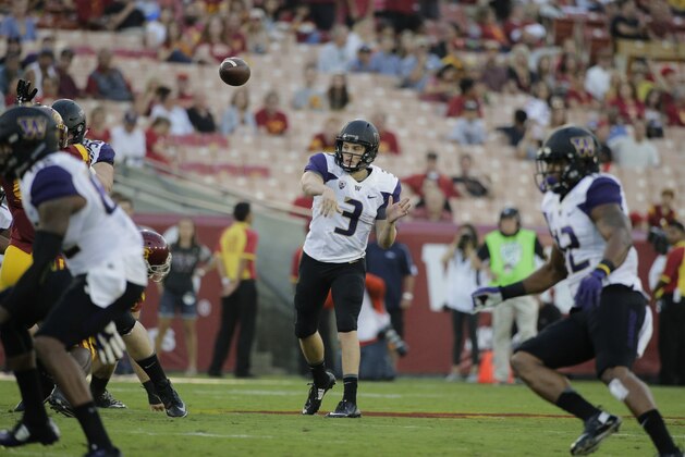 Washington quarterback Jake Browning throws a pass during the first half of an NCAA college football game against Southern California, Thursday, Oct. 8, 2015, in Los Angeles. (AP Photo/Jae C. Hong)