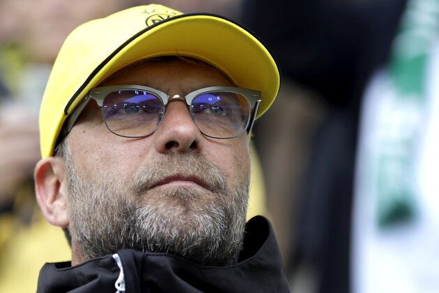 Dortmund's head coach Juergen Klopp arrives for the German first division Bundesliga soccer match between VfL Wolfsburg and Borussia Dortmund in Wolfsburg, Germany, Saturday, May 16, 2015. (AP Photo/Michael Sohn)