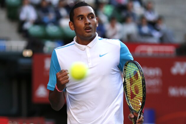 Australia's Nick Kyrgios reacts to a point won over Spain's Roberto Bautista Agut during their second round singles match at the Japan Open tennis tournament in Tokyo, Thursday, Oct. 8, 2015. (AP Photo/Shuji Kajiyama)