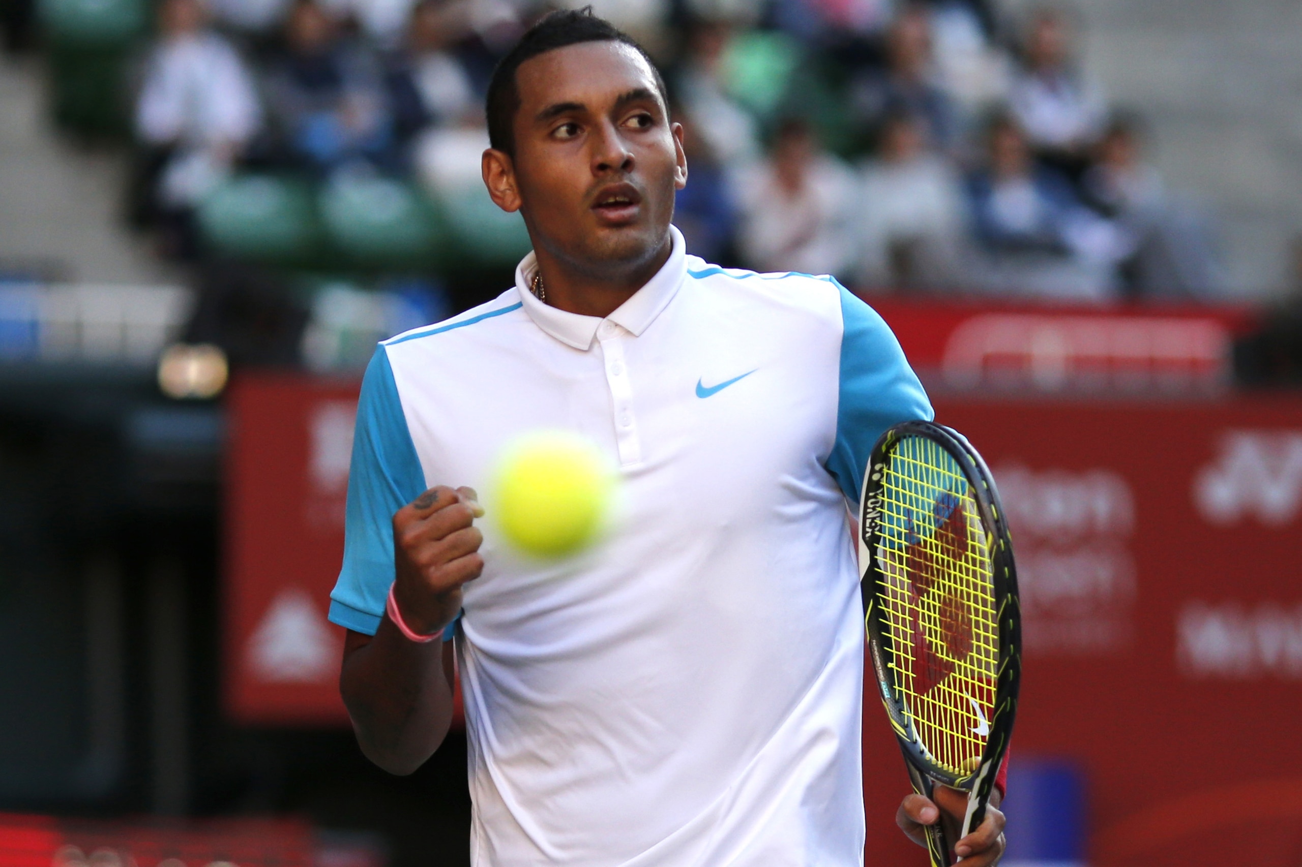 Australia's Nick Kyrgios reacts to a point won over Spain's Roberto Bautista Agut during their second round singles match at the Japan Open tennis tournament in Tokyo, Thursday, Oct. 8, 2015. (AP Photo/Shuji Kajiyama)