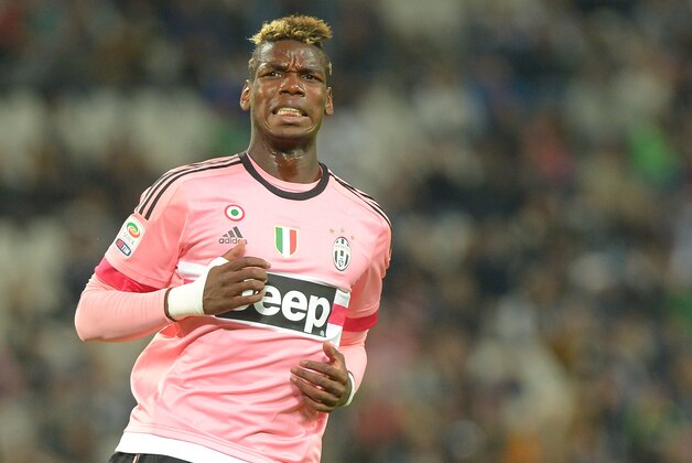 Juventus' Paul Pogba reacts after missing a chance to score during a Serie A soccer match between Juventus and Frosinone at the Juventus stadium, in Turin, Italy, Wednesday, Sept. 23, 2015. (AP Photo/ Massimo Pinca)
