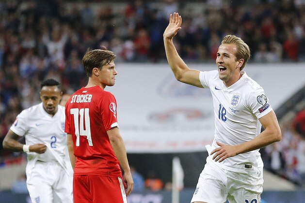 England’s Harry Kane celebrates after scoring the opening goal during the Euro 2016 Group E qualifying soccer match between England and Switzerland at Wembley stadium in London, England, Tuesday, Sept. 8, 2015 . (AP Photo/Frank Augstein)