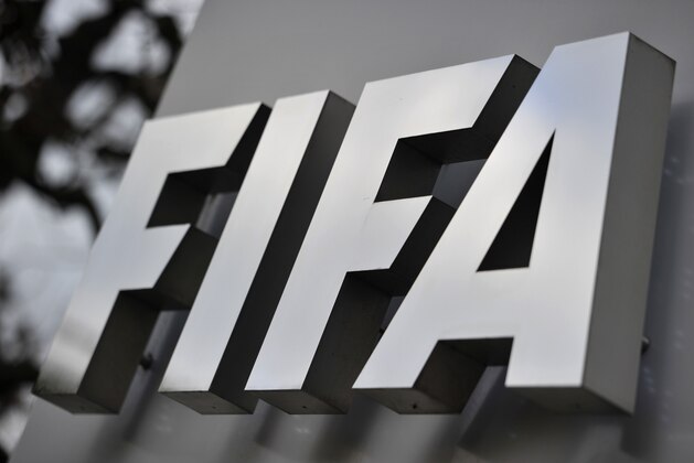 ZURICH, SWITZERLAND - OCTOBER 09:  A FIFA logo next to the entrance at the FIFA headquarters on October 9, 2015 in Zurich, Switzerland. On Thursday, FIFA's Ethics Committee provisionally banned FIFA President Joseph S. Blatter from all football activities for the duration of 90 days.  (Photo by Harold Cunningham/Getty Images)