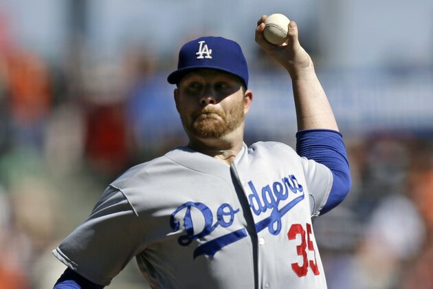 Los Angeles Dodgers pitcher Brett Anderson works against the San Francisco Giants in the first inning of a baseball game Thursday, Oct. 1, 2015, in San Francisco. (AP Photo/Ben Margot)