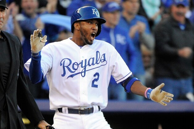 KANSAS CITY, MO - OCTOBER 09:  Alcides Escobar #2 of the Kansas City Royals celebrates hitting a triple in the seventh inning against Will Harris #36 of the Houston Astros during game two of the American League Division Series at Kauffman Stadium on October 9, 2015 in Kansas City, Missouri.  (Photo by Ed Zurga/Getty Images)