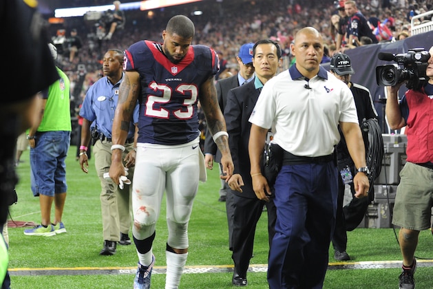 Houston Texans' Arian Foster (23) is walked off the field after an injury during the first half of an NFL football game against the Indianapolis Colts, Thursday, Oct. 8, 2015, in Houston. (AP Photo/Eric Christian Smith)