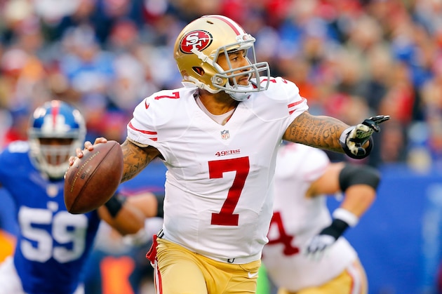 EAST RUTHERFORD, NJ - NOVEMBER 16:  (NEW YORK DAILIES OUT)    Colin Kaepernick #7 of the San Francisco 49ers in action against the New York Giants on November 16, 2014 at MetLife Stadium in East Rutherford, New Jersey. The 49ers defeated the Giants 16-10.  (Photo by Jim McIsaac/Getty Images)