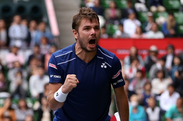 Stan Wawrinka of Switzerland celebrates after defeating Gilles Muller of Luxembourg during their singles semifinal match at the Japan Open men’s tennis tournament in Tokyo, Saturday, Oct. 10, 2015. (AP Photo/Eugene Hoshiko)