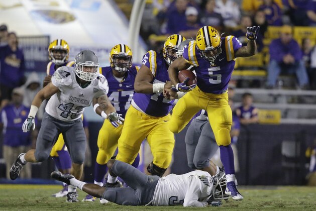 LSU running back Derrius Guice (5) carries in the second half of an NCAA college football game against Eastern Michigan in Baton Rouge, La., Saturday, Oct. 3, 2015. LSU won 44-22. (AP Photo/Gerald Herbert)