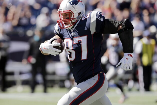 New England Patriots tight end Rob Gronkowski runs after catching a pass in the first half of an NFL football game against the Jacksonville Jaguars, Sunday, Sept. 27, 2015, in Foxborough, Mass. (AP Photo/Charles Krupa)